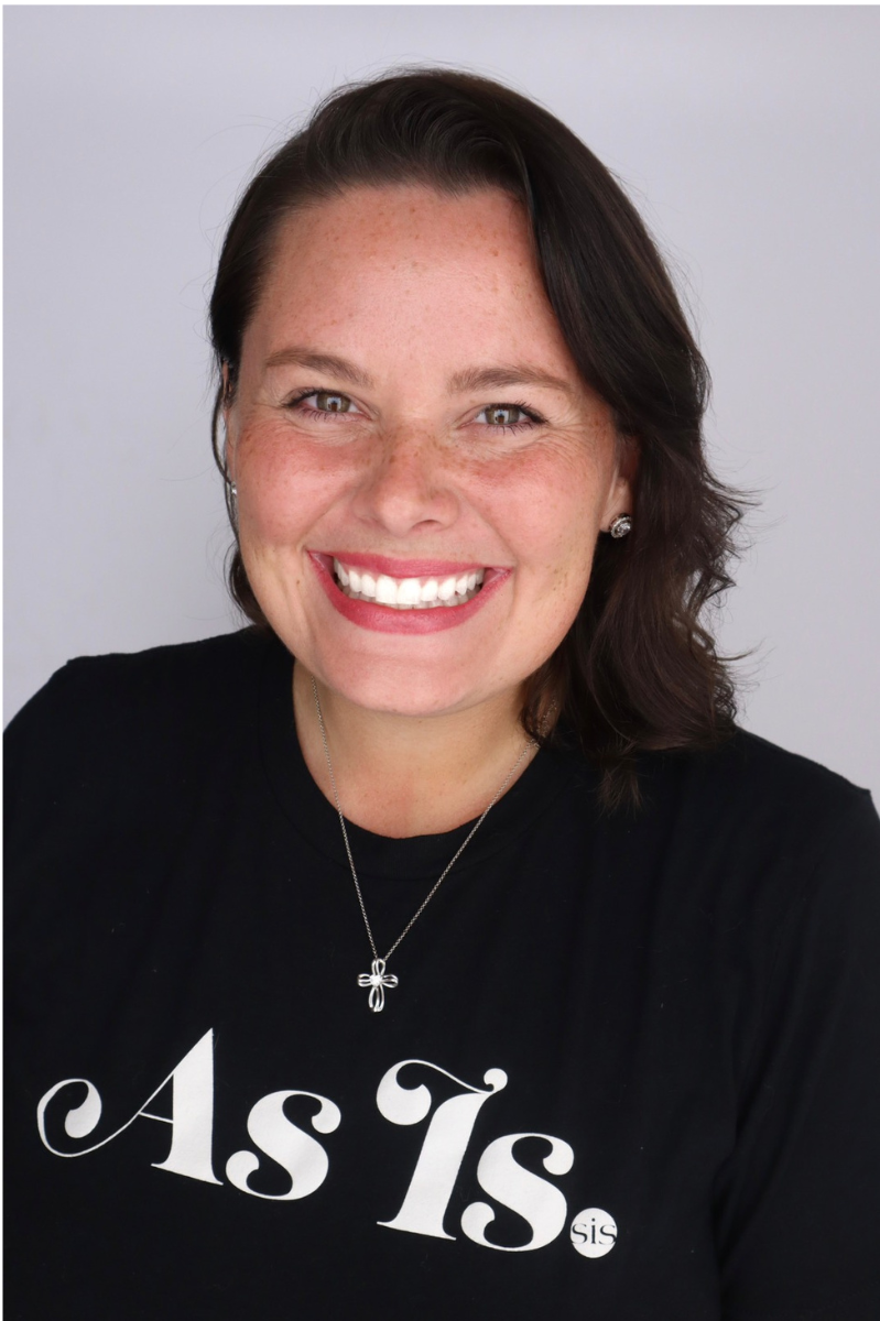 Michaela Fisher, founder of As Is, Sis, smiling and representing a mission of self-love and empowerment