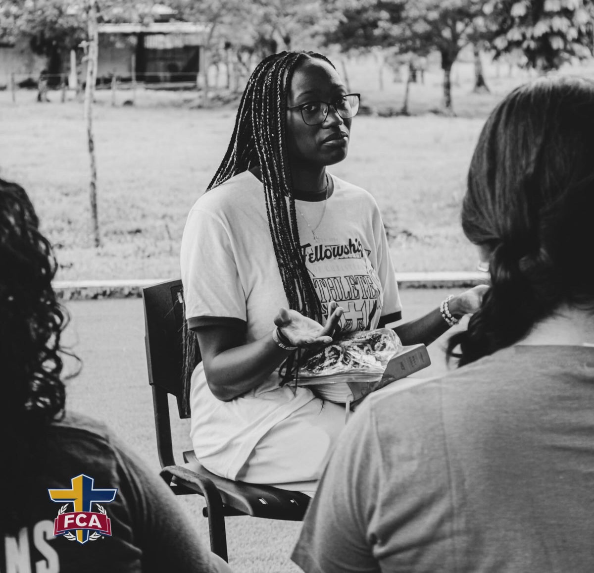 Women participating in group discussion circle, community support and leadership conversation
